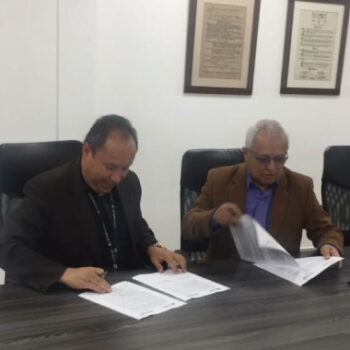 Padre Rector de la UCN y rector del tecnológica en el momento de firma de la alianza.